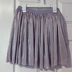 Pleated metallic skirt